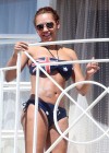 Melanie Brown - Bikini Candids on Balcony in LA